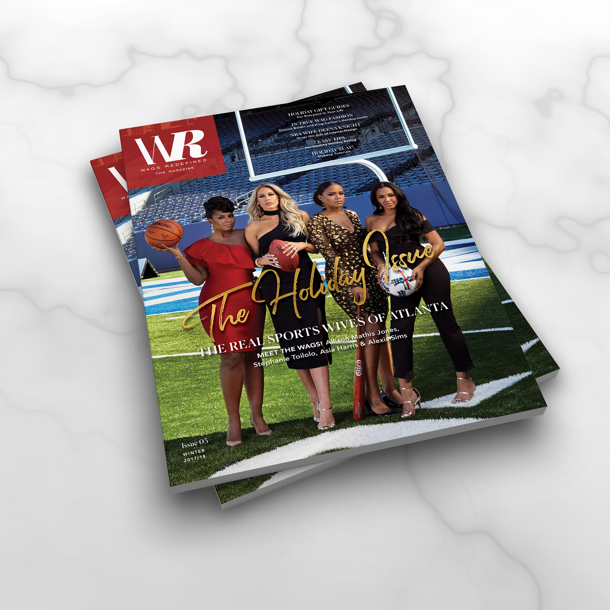WAGS Redefined — The Magazine, Holiday Issue print copies on a marble surface