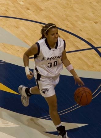 Point guard days — college basketball on scholarship.