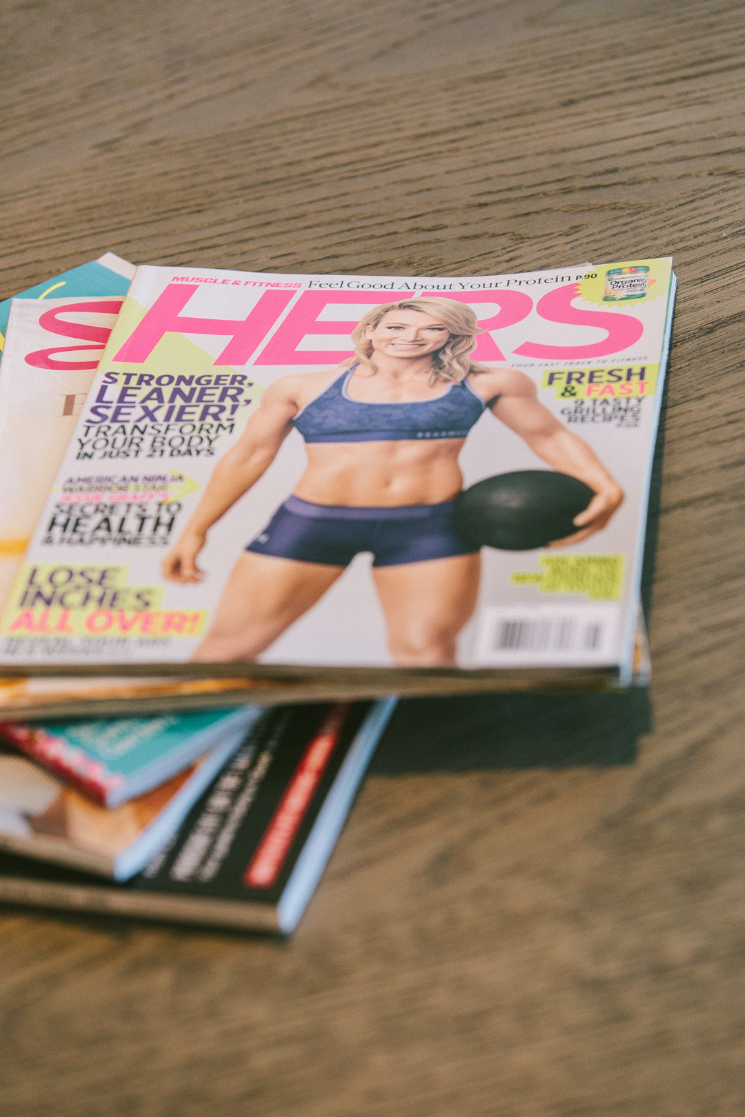 Stack of fitness and wellness magazines on the reading table in the lounge