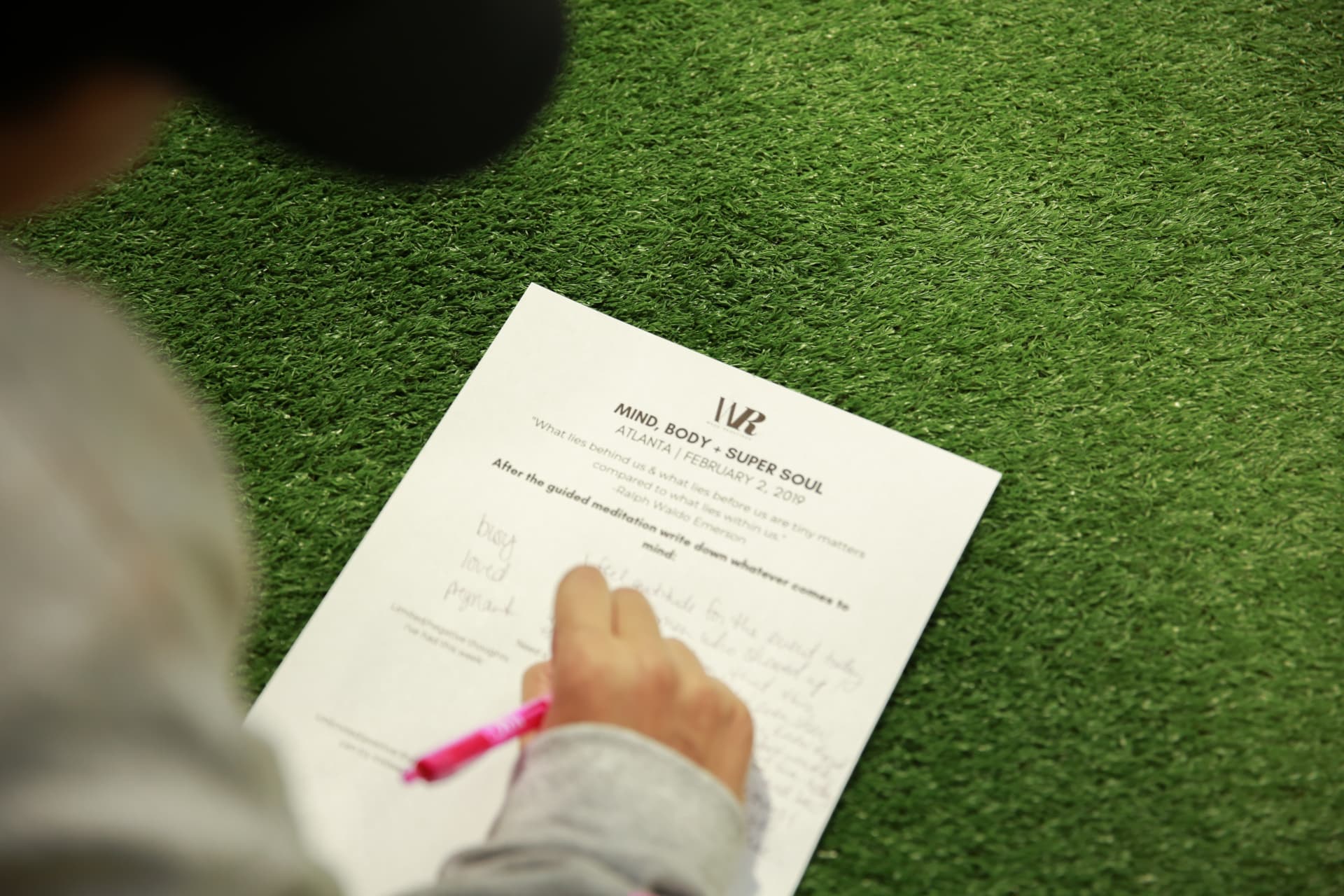 Member writing on the Mind, Body + Super Soul guided meditation worksheet
