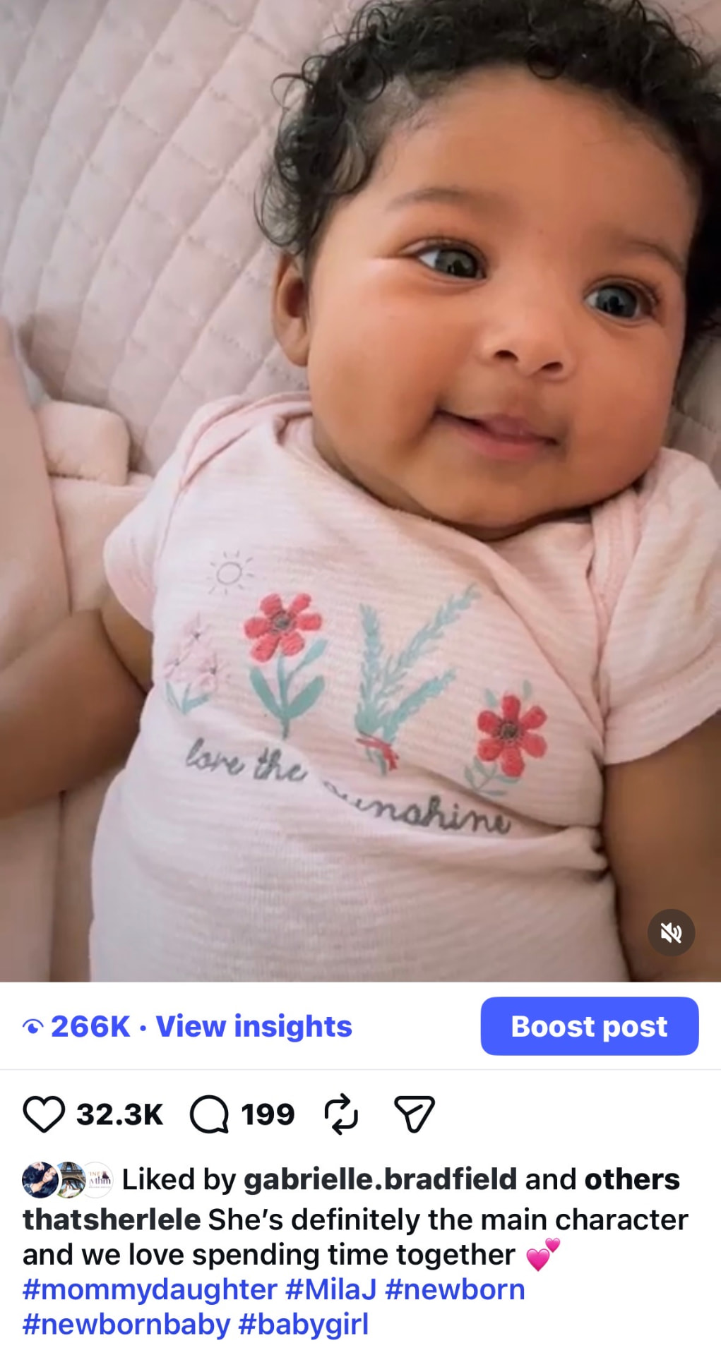 Instagram Reel screenshot of a smiling baby girl in a pink floral onesie — 266K views, 32.3K likes, 199 comments