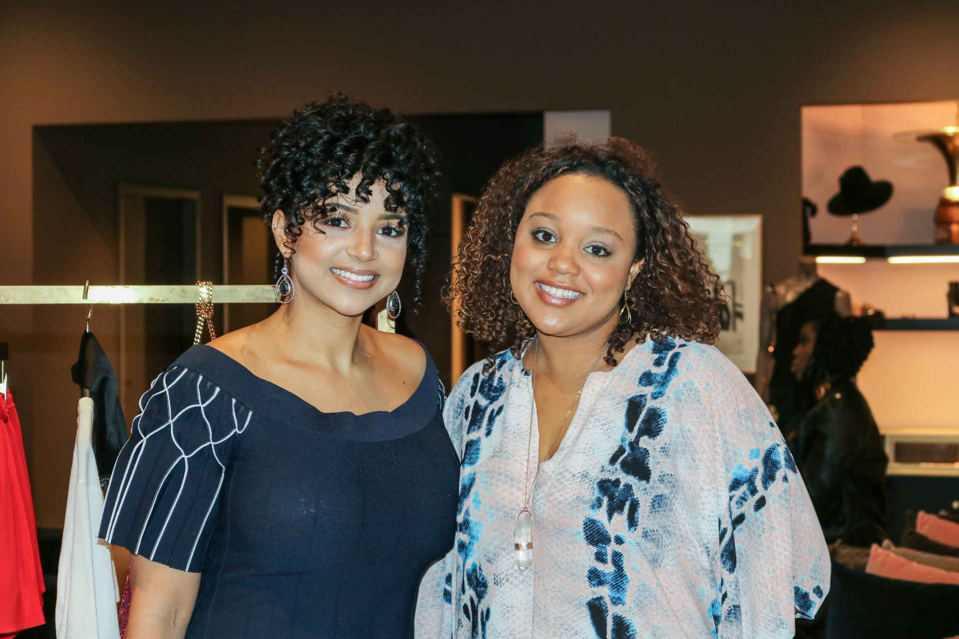 Two guests photographed together at the Super Bowl 51 WAGS dinner