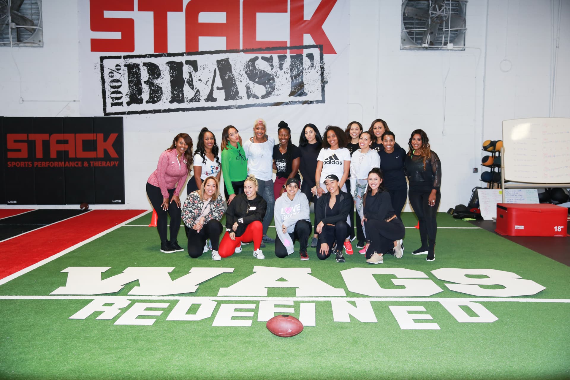 WAGS Redefined members gathered on the turf at STACK Sports Performance in Atlanta for Mind, Body + Super Soul